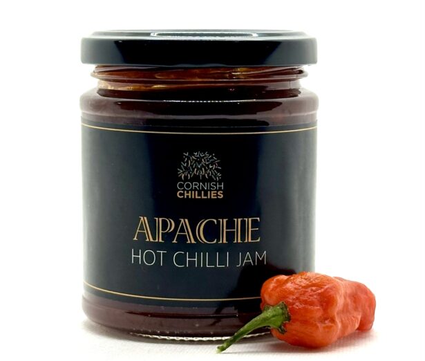Jar of Cornish chilli jam made with fresh farm-grown chillies, offering a perfect balance of sweet and heat.