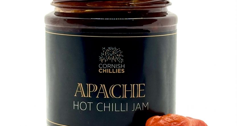 Jar of Cornish chilli jam made with fresh farm-grown chillies, offering a perfect balance of sweet and heat.